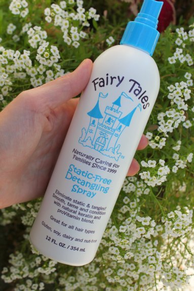 Fairy Tales haircare product in a woman's hand.