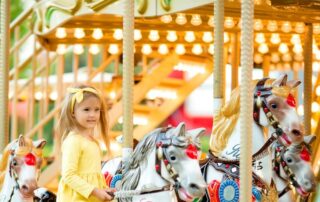 Young girl on a carousel