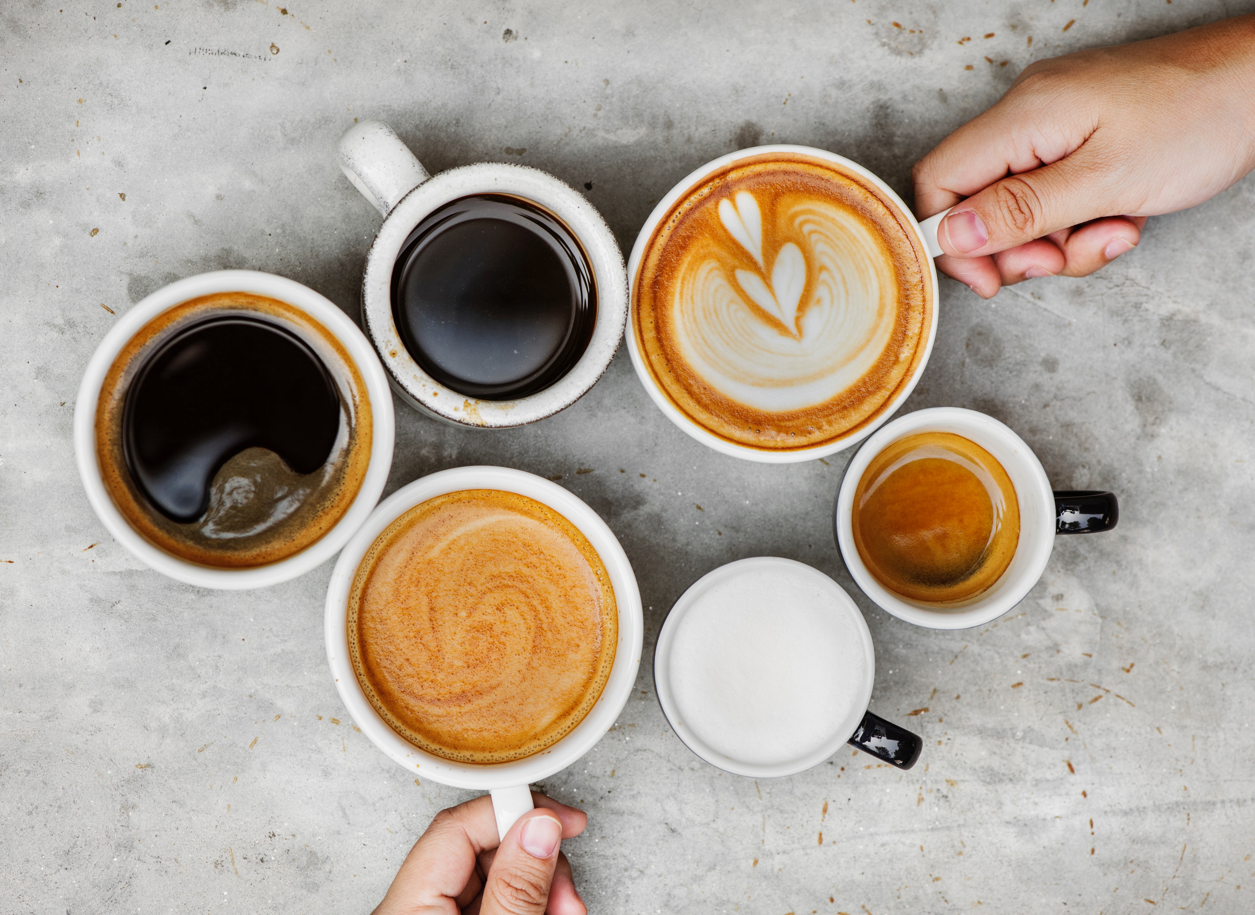 Various types of coffee on a table.