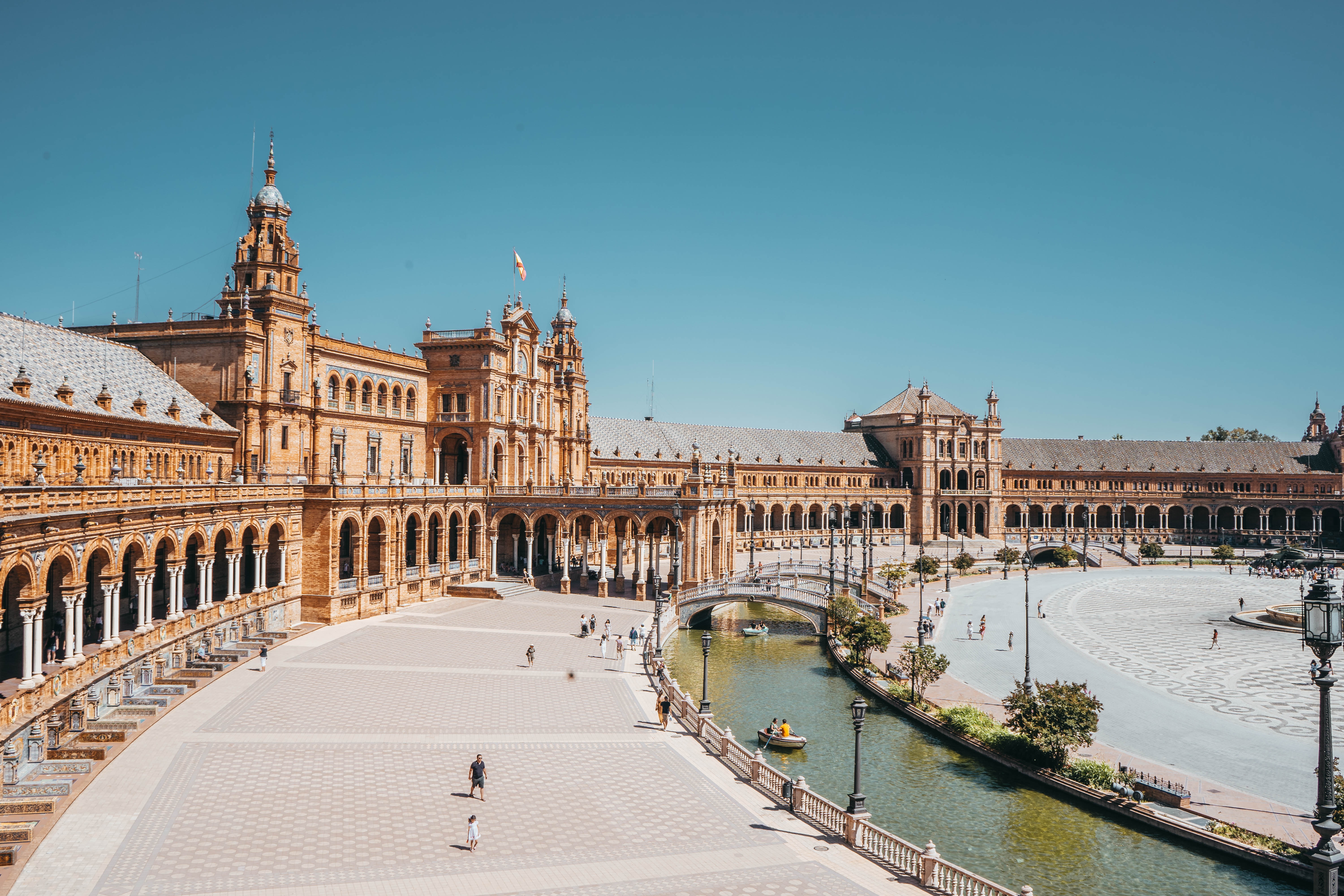 Buildings along a canal in Sevilla, Spain.