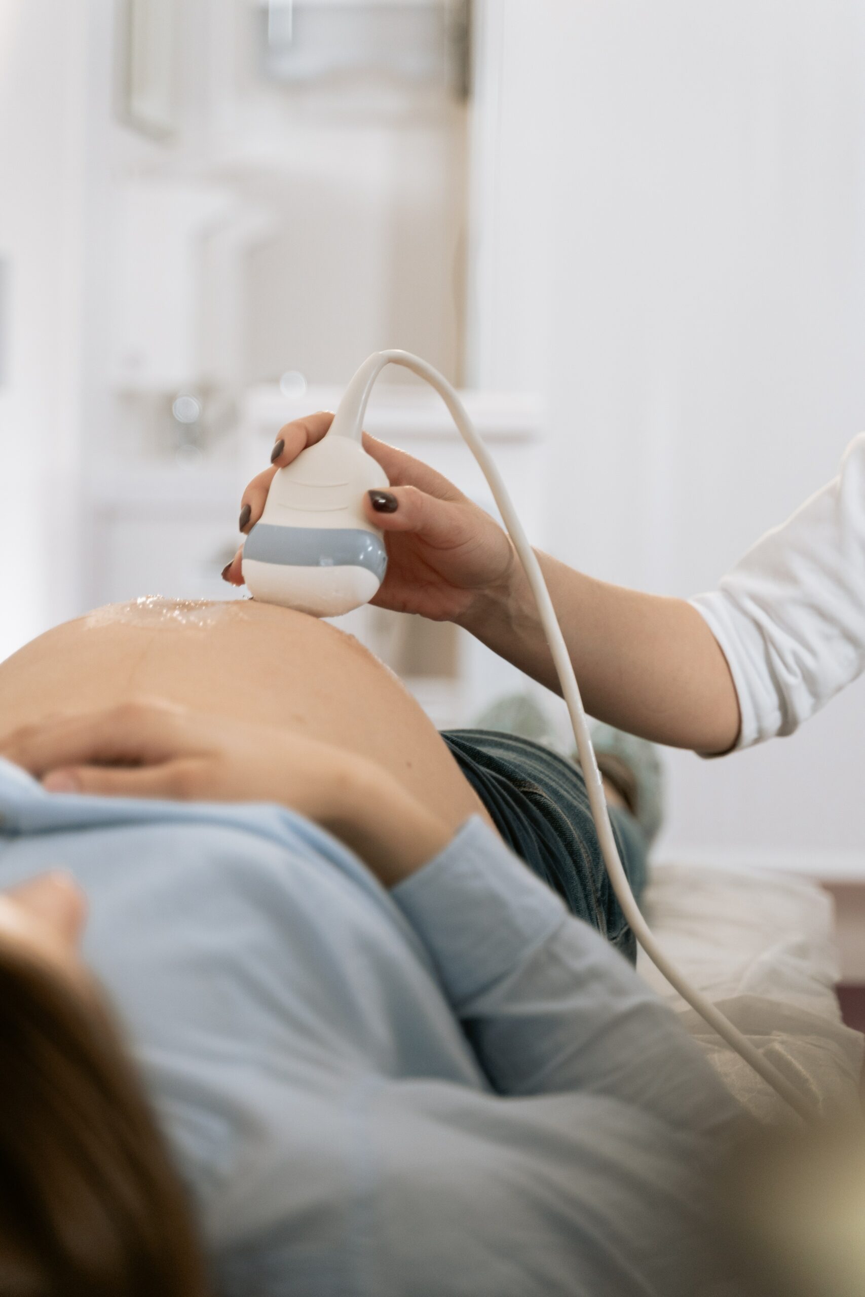 Pregnant woman at the doctor's office getting an ultrasound