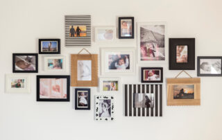 Photos hanging on a wall.